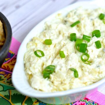 keto crab dip served in a white bowl. The white bowl is